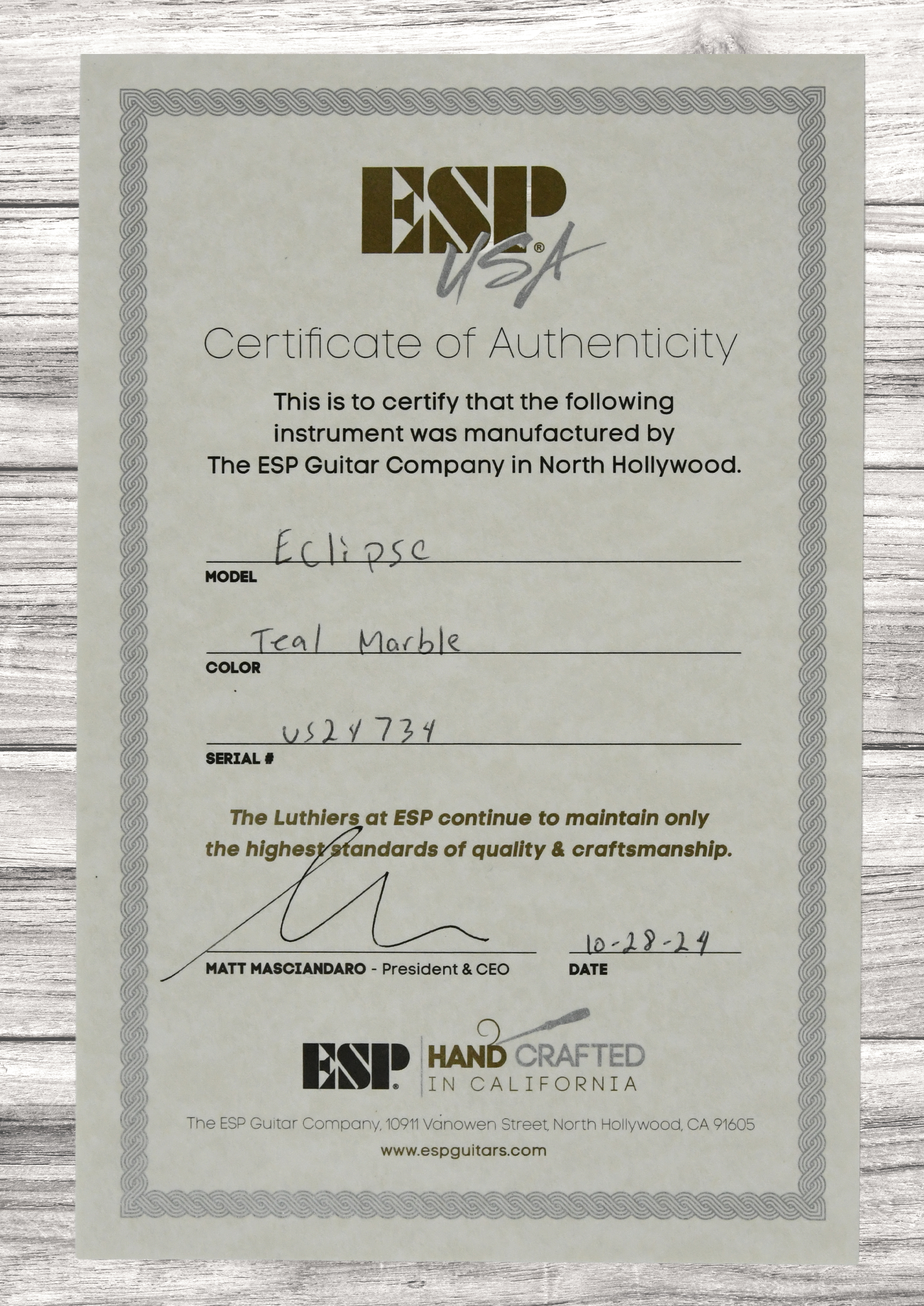 esp-usa-eclipse-teal-marble-satin-emg-bh_69137a906c142.jpg