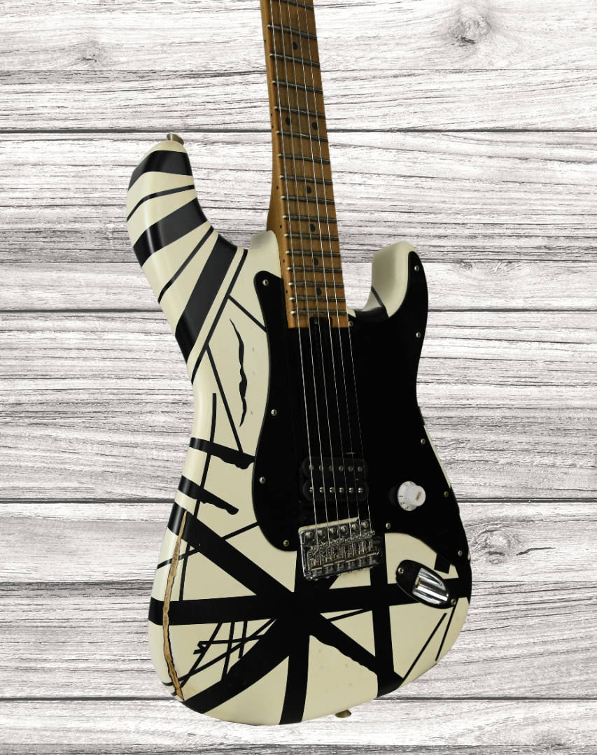 evh-striped-series-78-eruption-maple-fingerboard-white-with-black-stripes-relic_64a69cc1931d1.jpg