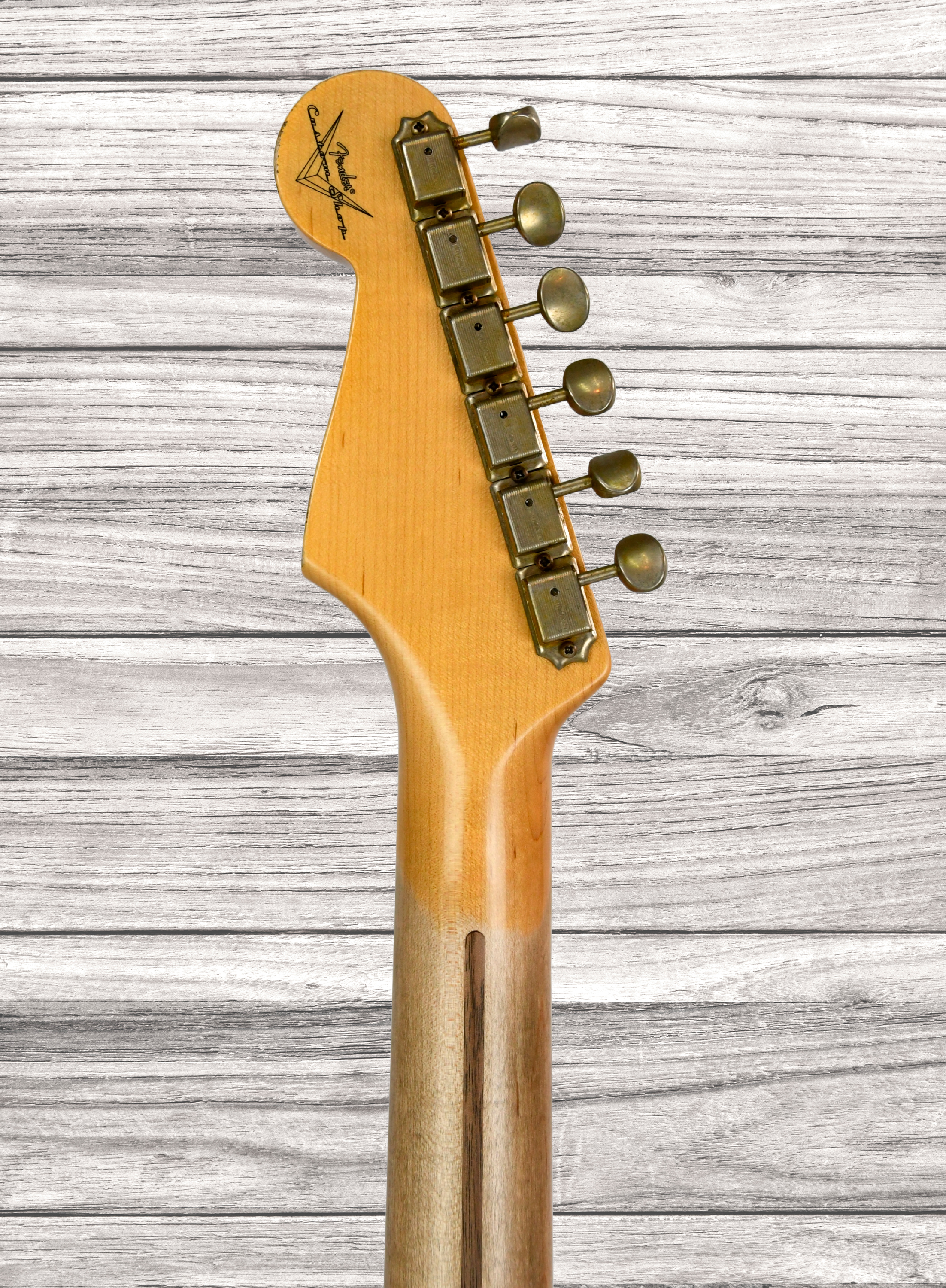 fender-custom-shop-58-relic-maple-neck-faded-aged-candy-apple-red_679bb4720ae3f.jpg