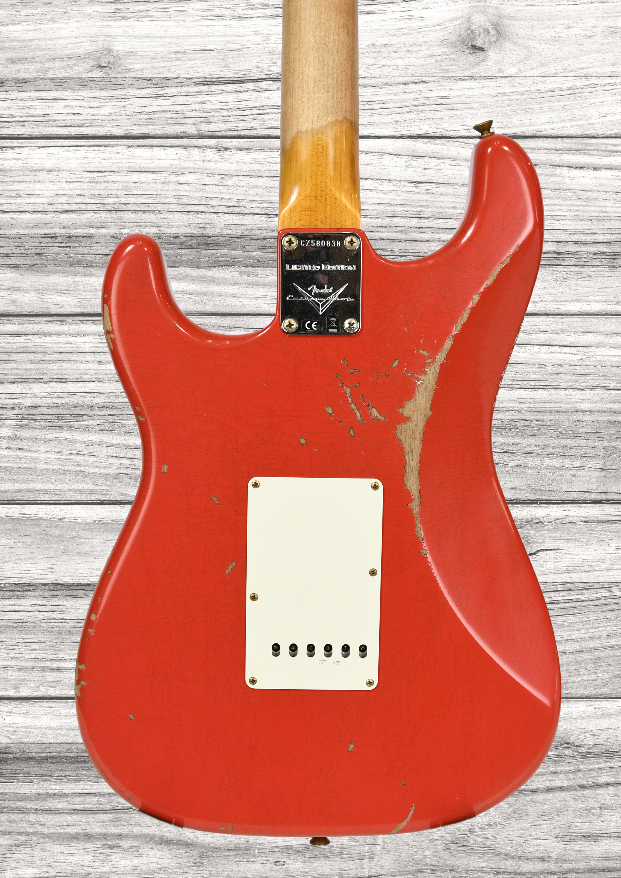 fender-custom-shop-63-stratocaster-heavy-relic-aged-fiesta-red_68fa413f388ce.jpg