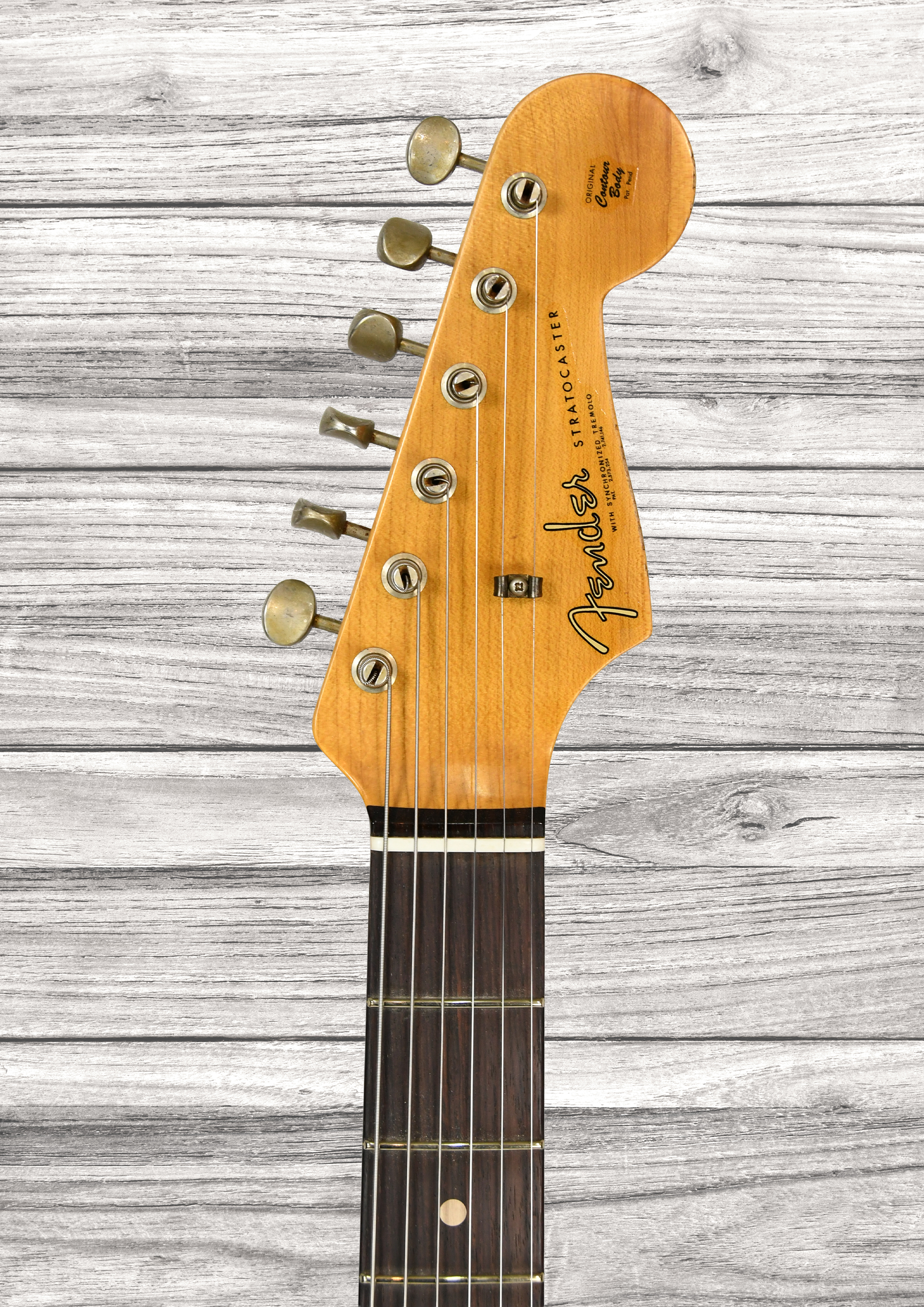 fender-custom-shop-63-stratocaster-heavy-relic-aged-fiesta-red_68fa41451b703.jpg