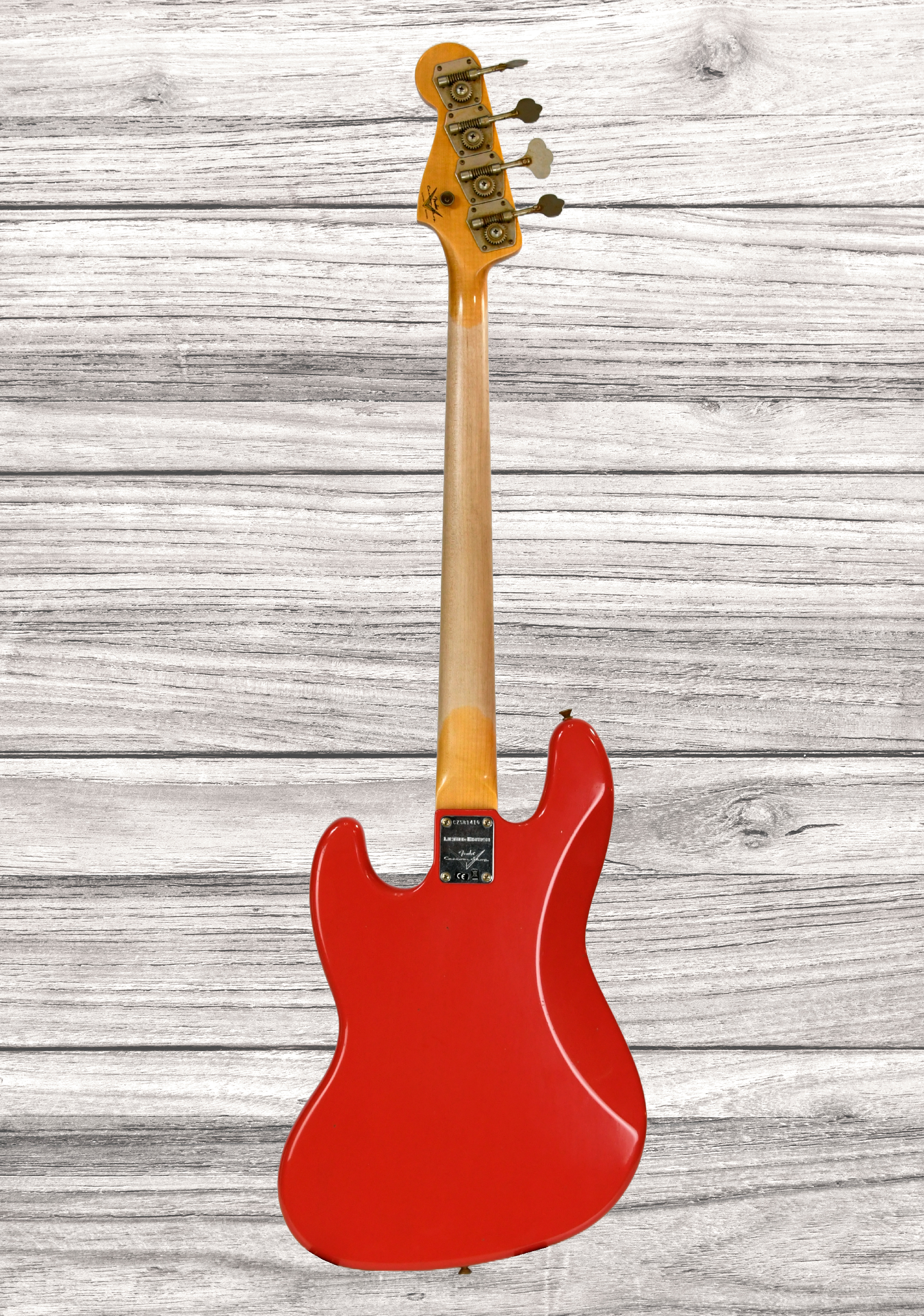 fender-custom-shop-64-jazz-bass-journeyman-aged-fiesta-red_67cae0edd17f9.jpg