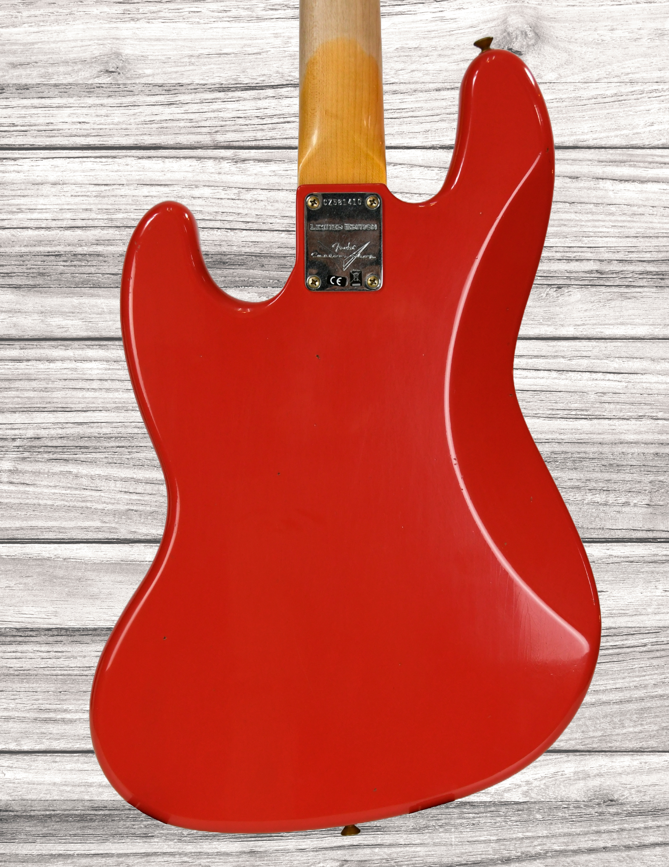 fender-custom-shop-64-jazz-bass-journeyman-aged-fiesta-red_67cae0f98e6d2.jpg
