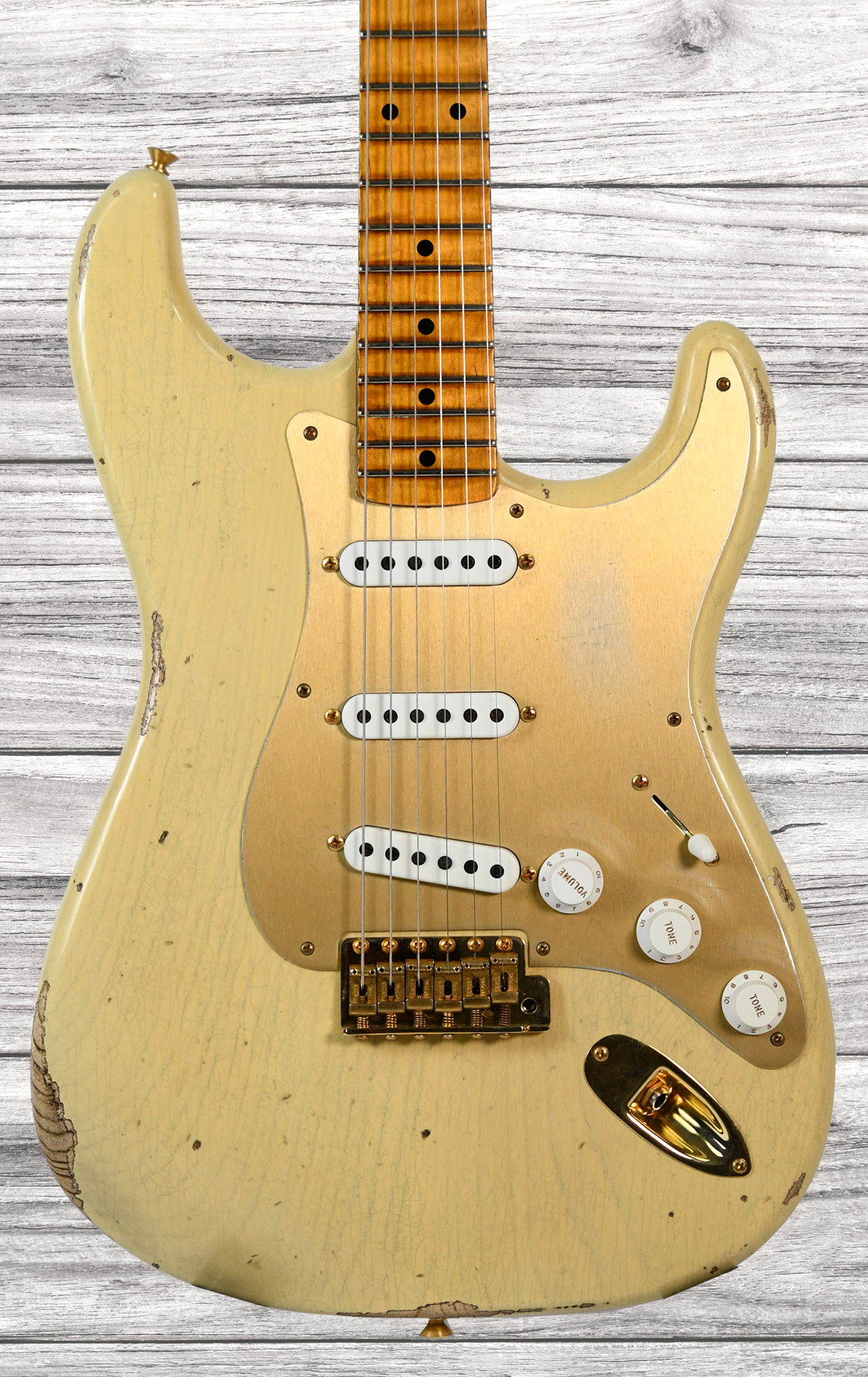 fender-custom-shop-limited-edition-55-bone-tone-relic-2a-flame-maple-fingerboard-aged-honey-blonde-gold-hardware_63c59187ce9ee.jpg