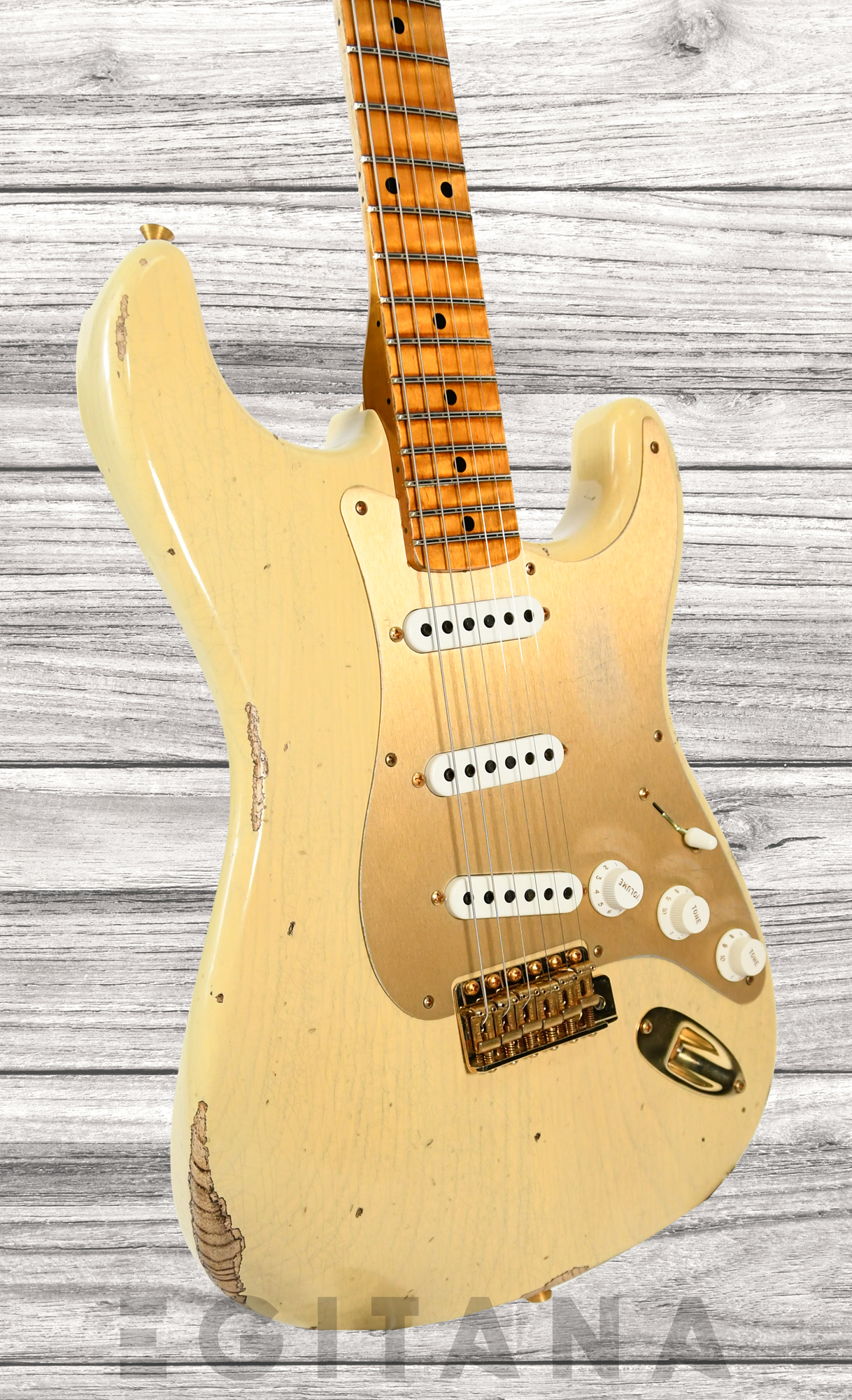 fender-custom-shop-limited-edition-55-bone-tone-relic-2a-flame-maple-fingerboard-aged-honey-blonde-gold-hardware_63c59188aa4f0.jpg