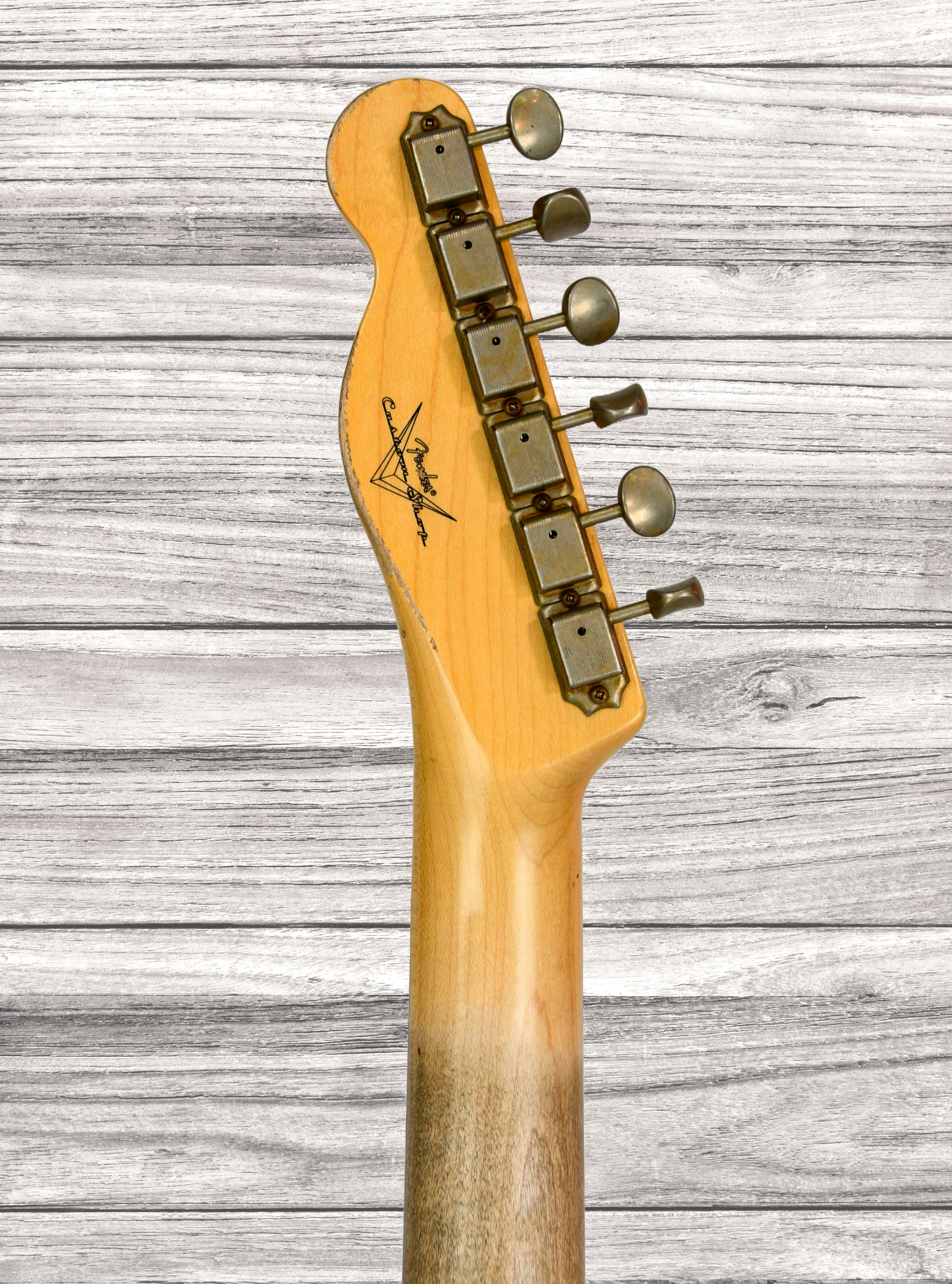 fender-custom-shop-time-machine-collection-60-tele-heavy-relic-faded-candy-apple-red_672e45bc4248c.jpg