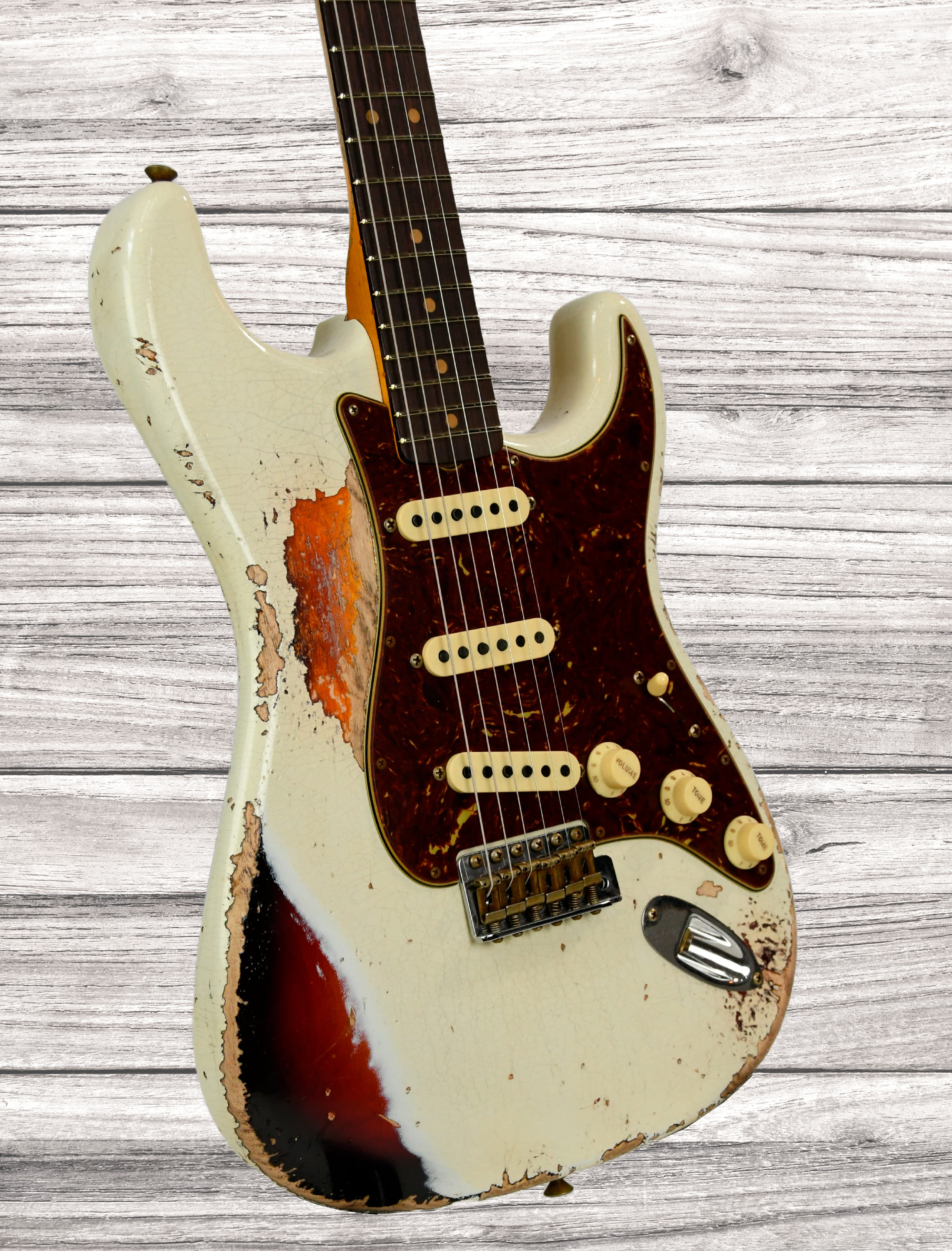 fender-custom-shop-time-machine-collection-63-strat-super-heavy-relic-chocolate-3-color-sunburst_678a94079296d.jpg