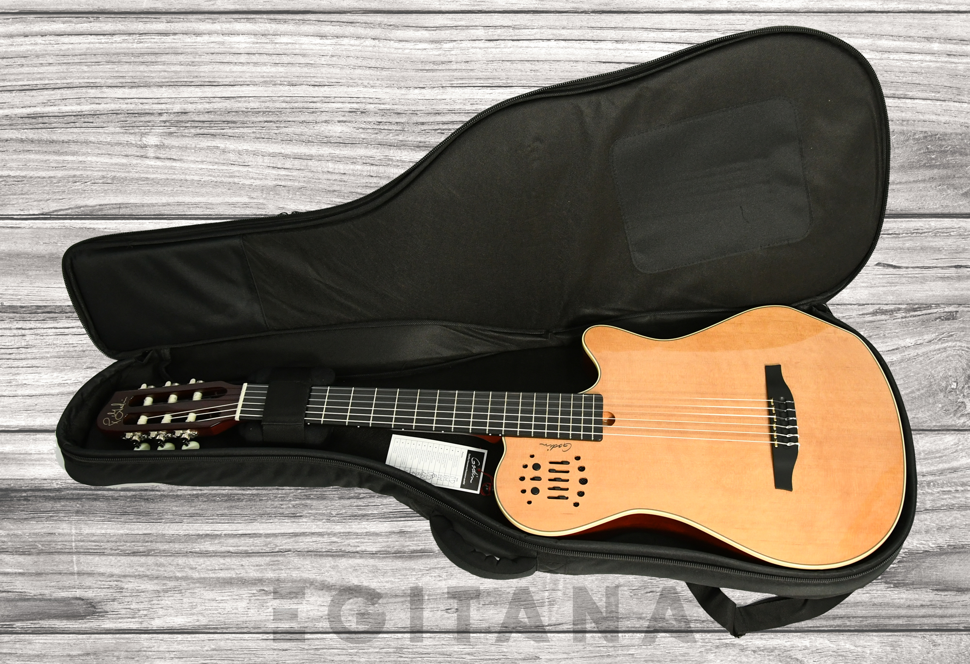 godin-multiac-grand-concert-natural-hg_63289cbe47811.jpg
