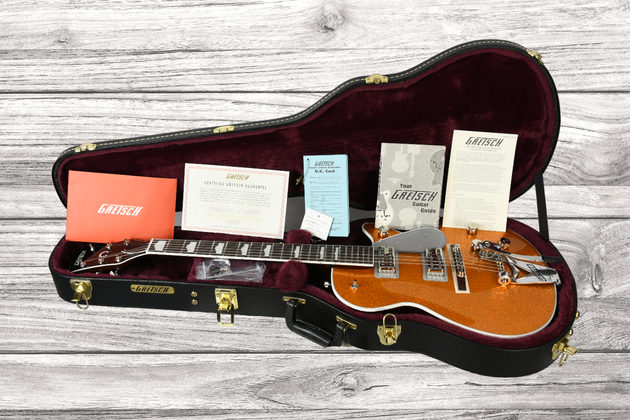 gretsch-g6129t-89-vintage-select-89-sparkle-jet-bigsby-rosewood-fingerboard-gold-sparkle_64b55b0a0ff00.jpg