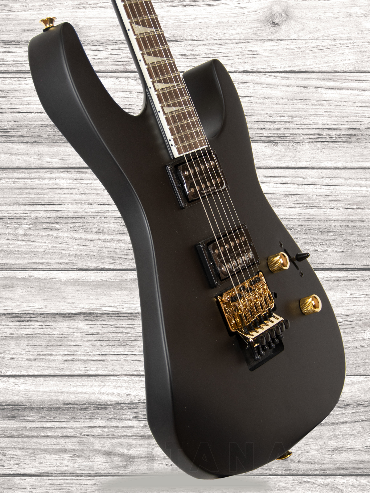 jackson-slxdx-soloist-satin-black_60a270f04ce38.jpg