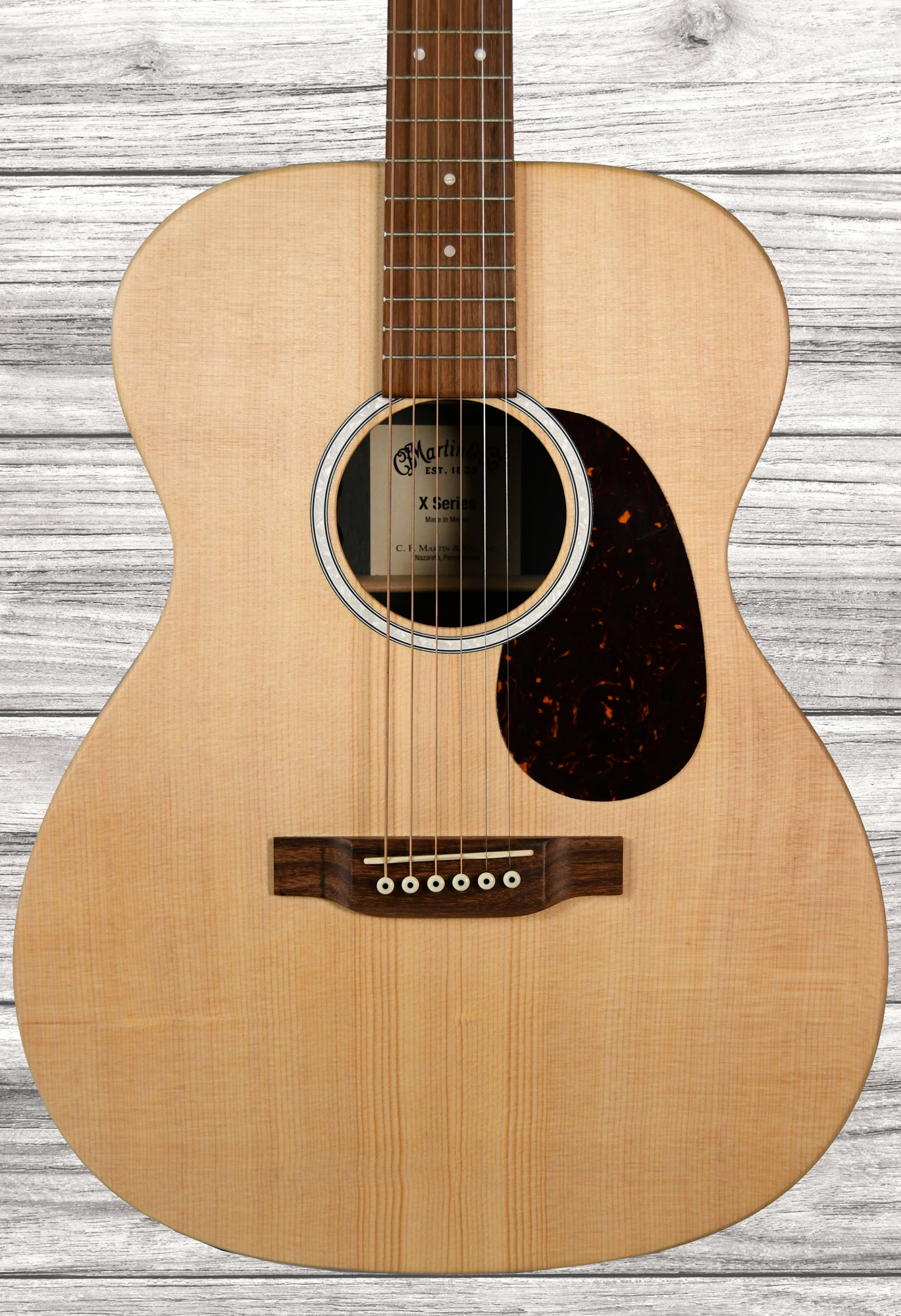 martin-guitarra-acustica-000-2-a-e-x-series-abeto-sitka-caoba-hpl_63b55ddb71bbe.jpg
