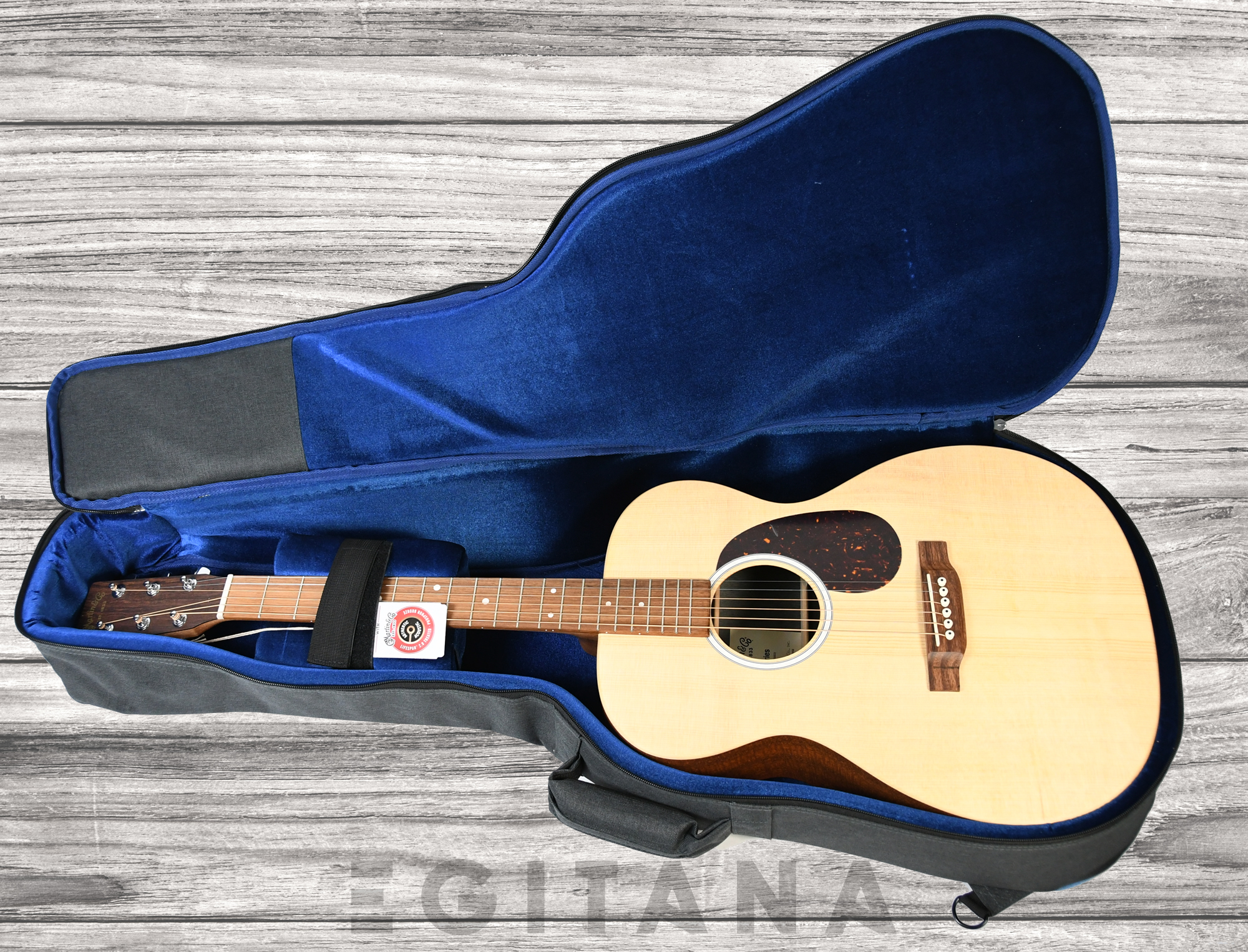 martin-guitarra-acustica-000-2-a-e-x-series-abeto-sitka-caoba-hpl_63b55de01d6b4.jpg