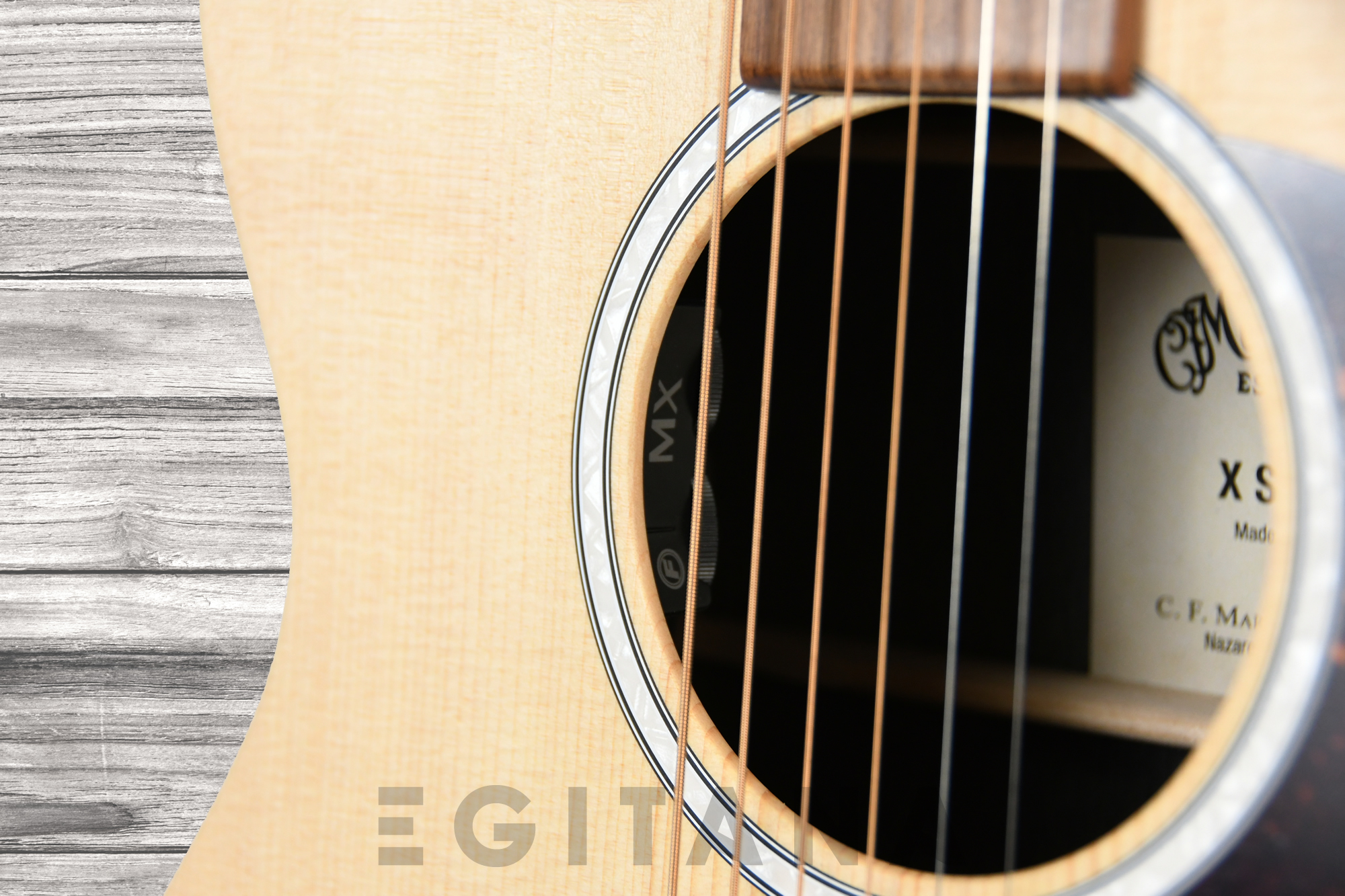 martin-guitarra-acustica-000-2-a-e-x-series-abeto-sitka-caoba-hpl_63b55de191a2d.jpg